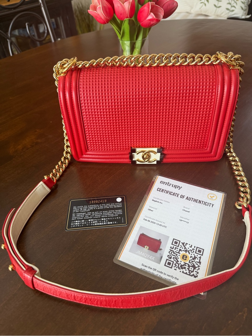 CHANEL Red Quilted Boy Bag with Gold Chain Hardware